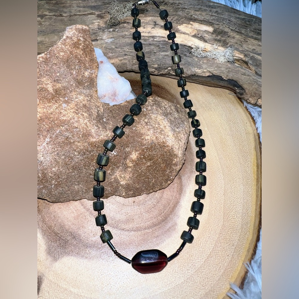 Handmade clay beaded necklace with purple glass focal bead and mini glass beads.